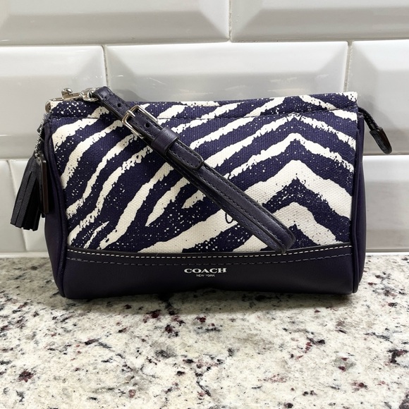 Coach Handbags - Coach Legacy Zebra Wristlet Clutch in Purple NWT